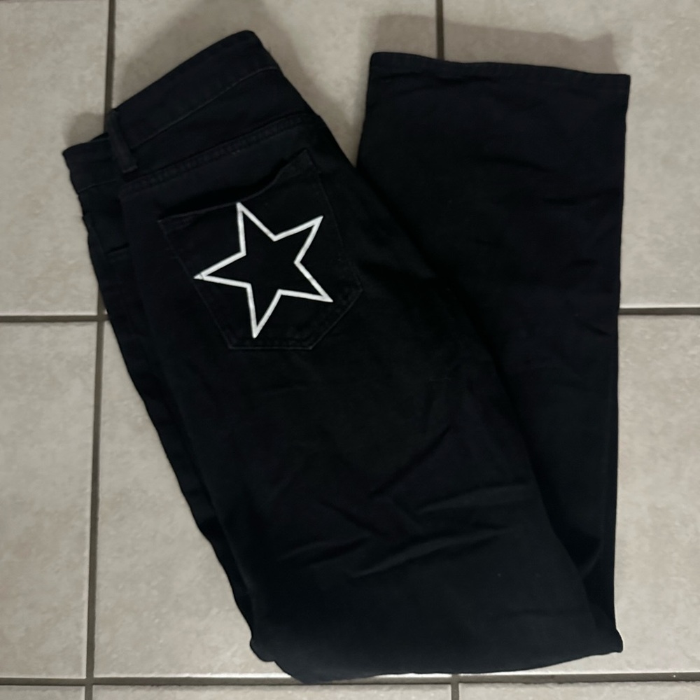 Black wide leg jeans with star patched pockets